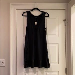 Black sleeveless dress with pockets